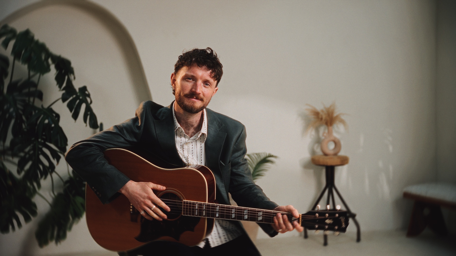 Jonny Ball performing guitar